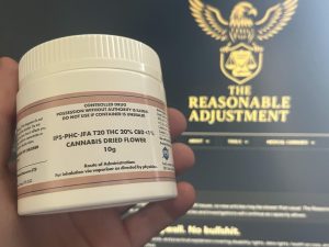 Box of IPS JFA T20 Jet Fuel Apricot medical cannabis shown in front of The Reasonable Adjustment website on a laptop screen.