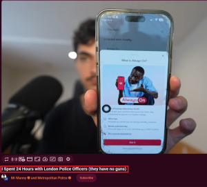 Mr Manny holds up a Holafly promotion above YouTube attribution naming Mr Manny and Metropolitan Police